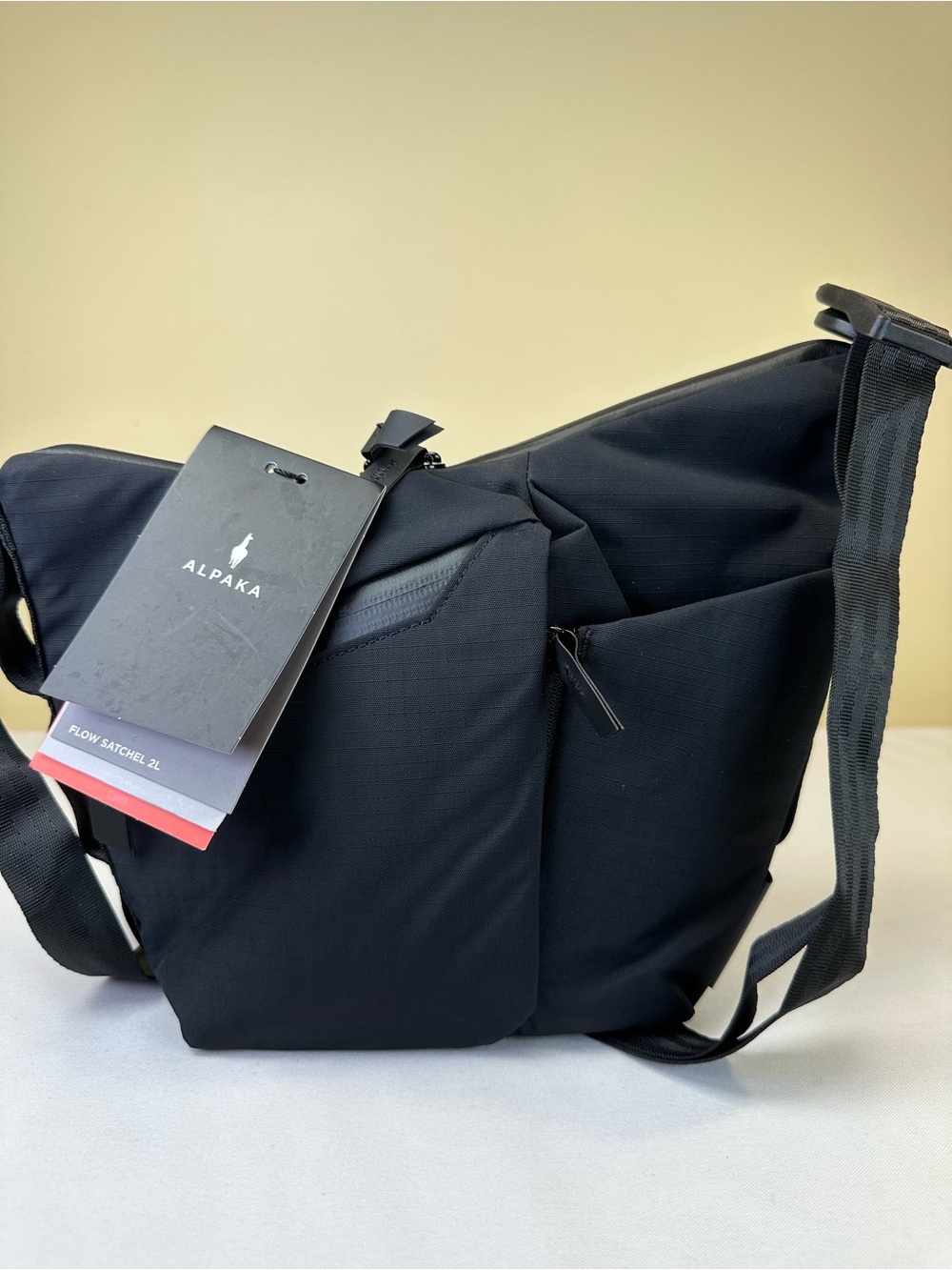 Alpaka Flow Satchel 2L Weather resistant black satchel NWT